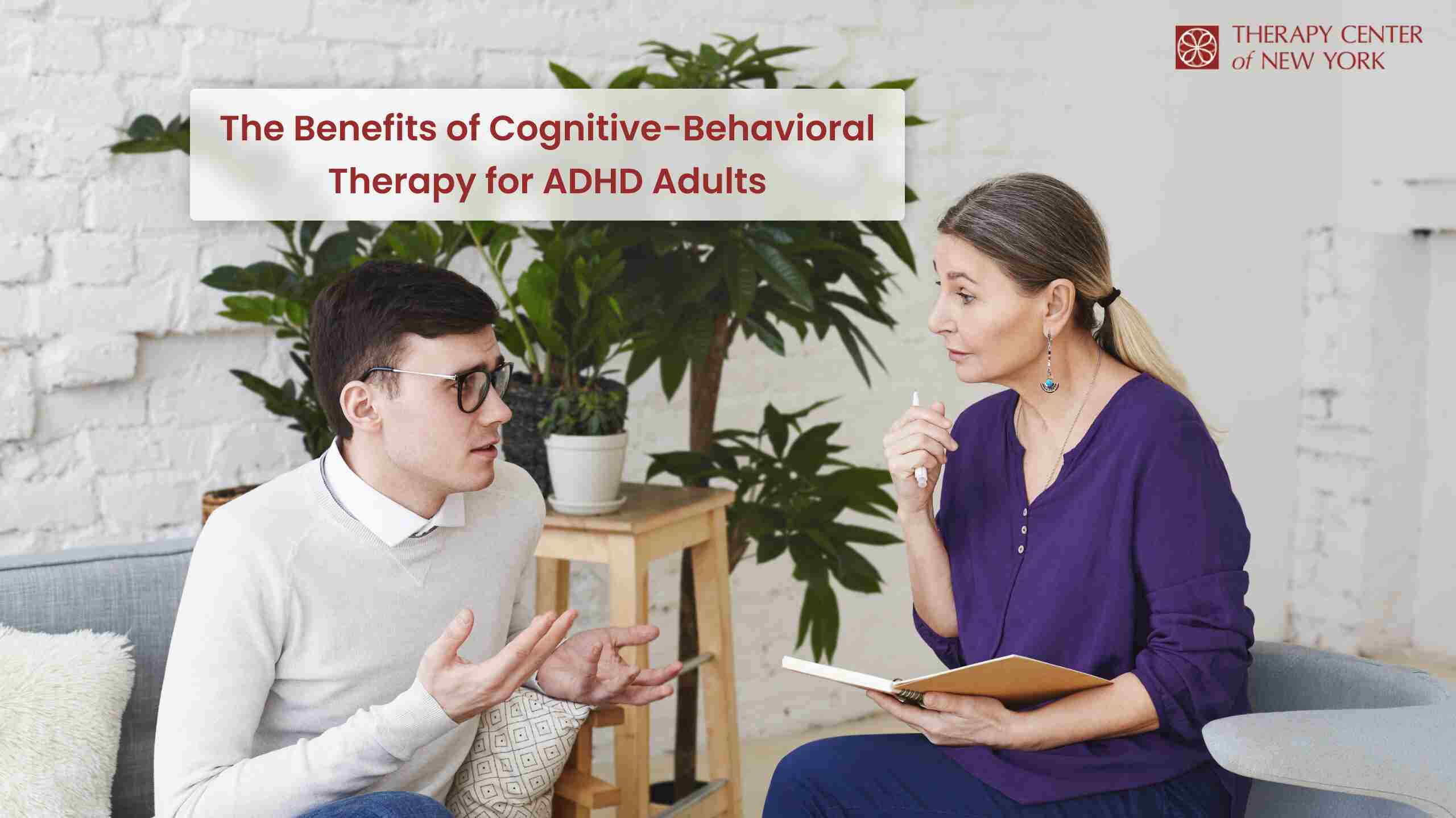 A confident adult sitting at a desk, smiling, while focusing on work, symbolizing the positive impact of CBT for ADHD management.